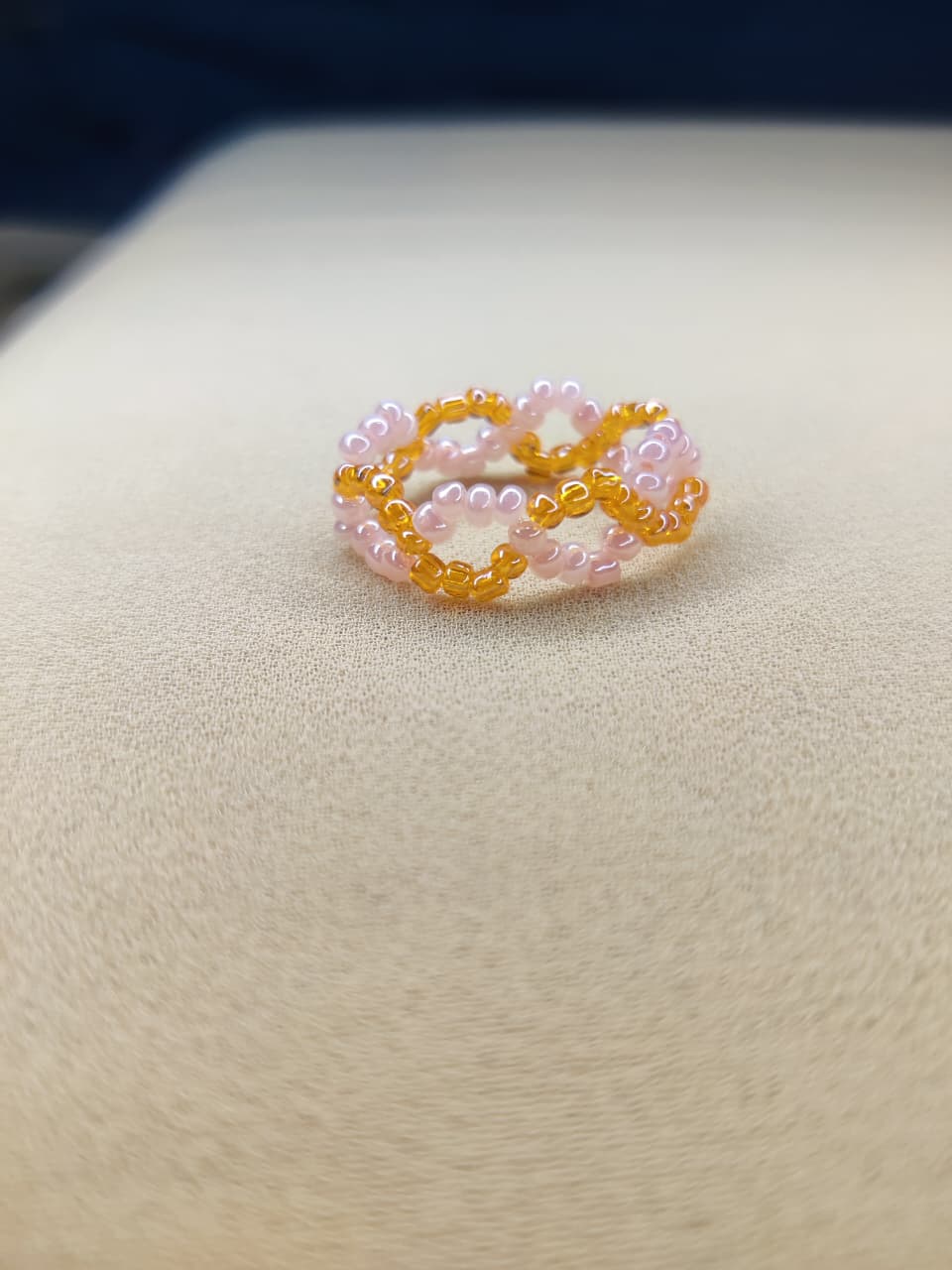 Peach twisted ring