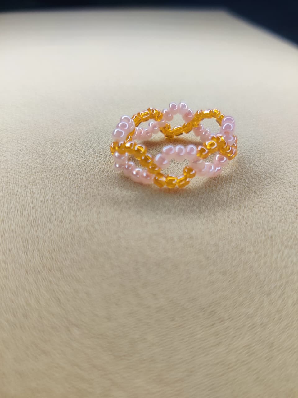 Peach twisted ring
