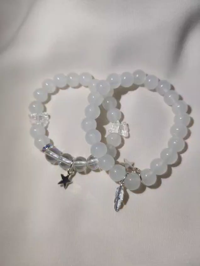 White pair with star and leaf