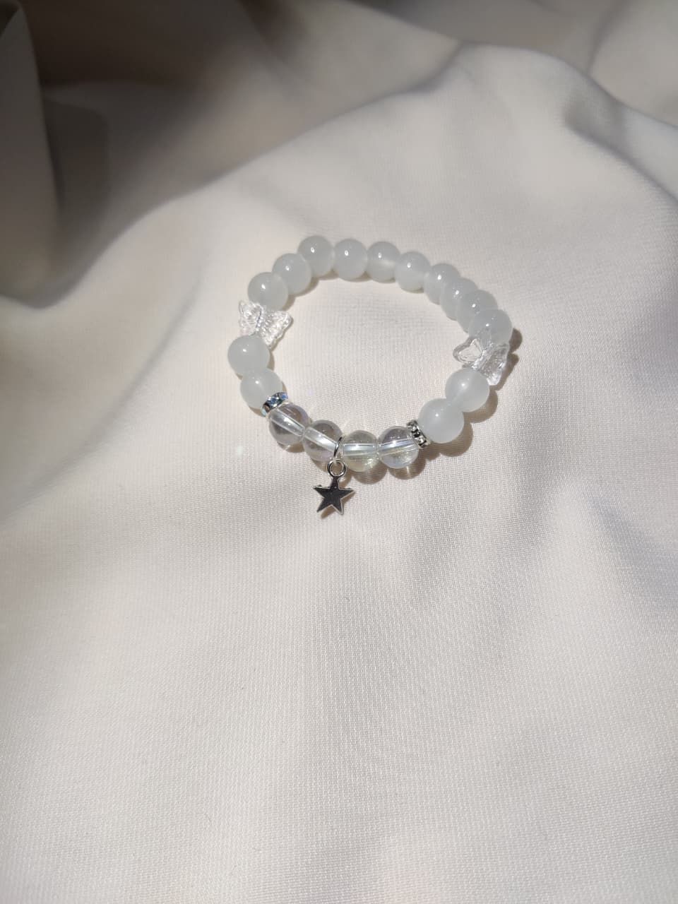 White pair with star and leaf